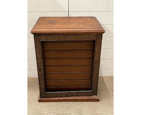 A Victorian mahogany collectors cabinet with a inlaid hinged door (missing glass) opening to eight air tight drawers, each wi