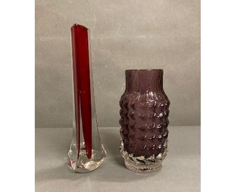 A Whitefriars Aubergine pine cone glass vase and a ruby red three sided glass vase 