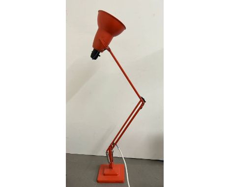 An Anglepoise orange lamp 