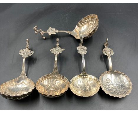 A selection of five antique silver Dutch caddy spoons.