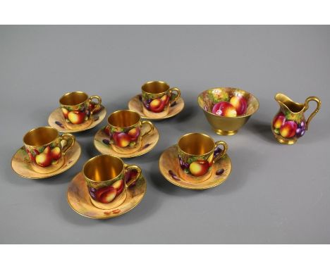 Royal Worcester part porcelain coffee set; comprising six cups, six saucers, sugar bowl and milk jug, pattern nr W9535 to bas