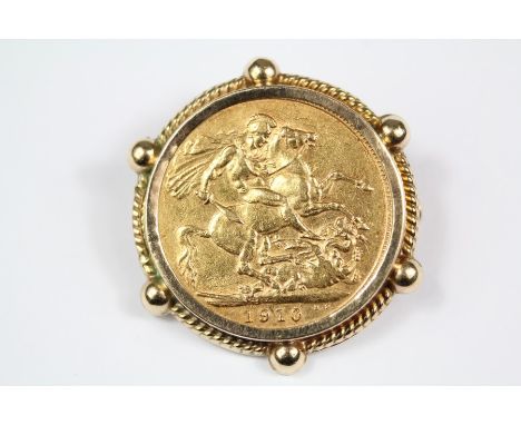 1910 Edward VII full gold sovereign, mounted in a 9ct gold surround, weight of mount approx 1.5 gms.