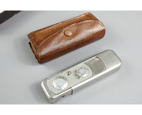 Vintage VEF Minox spy camera nr 4032, inscribed to verso VEF Minox Riga and Made in Latvia, silvered finish in the original l