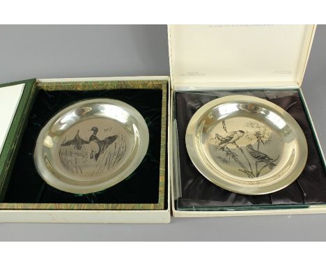 Franklin Mint - sterling silver dishes; the first entitled 'The Goldfinch' by James Fenwick Lansdowne nr 6246 approx 20 cms d
