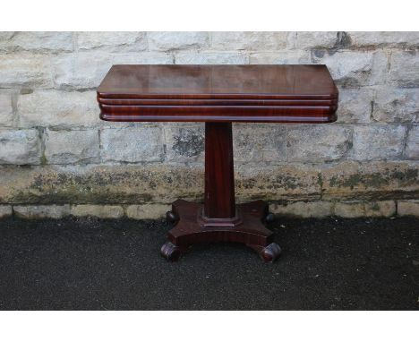 A Victorian mahogany card/games table, rectangular design, graduated column terminating on a quatrefoil base, green baize int