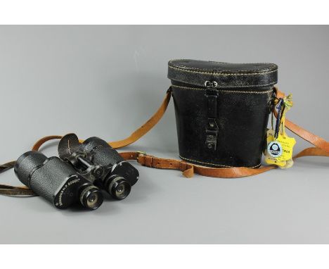 A pair of WWII German Nazi 10 x 50 binoculars (dienstglas nr 288801) BEH KF, housed in the original black case with Swastika 