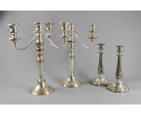 Two good quality silver plate over copper twin branch candelabra approx 37 cms h, together with two single candlesticks appro