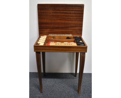 A small chess and games table, 37 x 27 x 43cm.