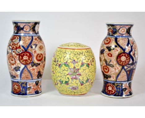 An interesting pair of 19th century Chinese Imari vases (H. 15cm), together with a mid 20th century Chinese tea caddy.