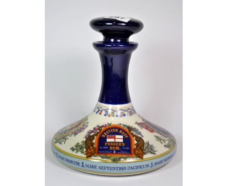 A commemorative ceramic ships decanter.
