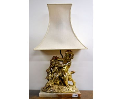 A 1920s glazed and gilt terracotta table lamp with an alabaster base, H. 36cm (figure).