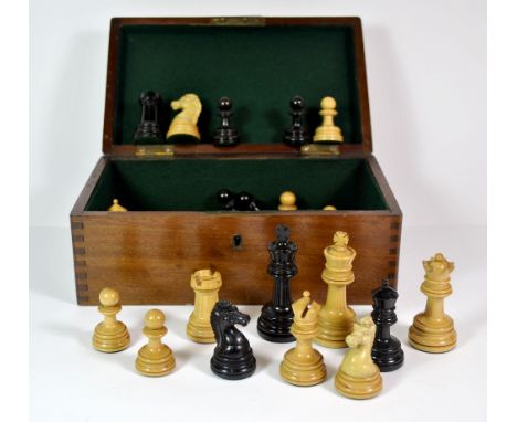 A boxed chess set. King approx 7.2 cms. Weighted.