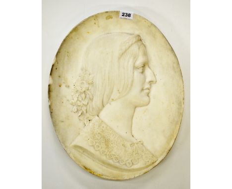 A 19th century carved white marble panel portrait of a young woman wearing a lace collar, 38 x 47cm.