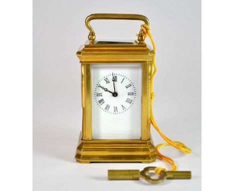 A miniature brass carriage clock, H. 9.5cm.