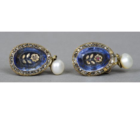 A pair of 19th century unmarked yellow metal diamond and ruby set ear pendants
Each of oval drop form headed with a pearl.  E
