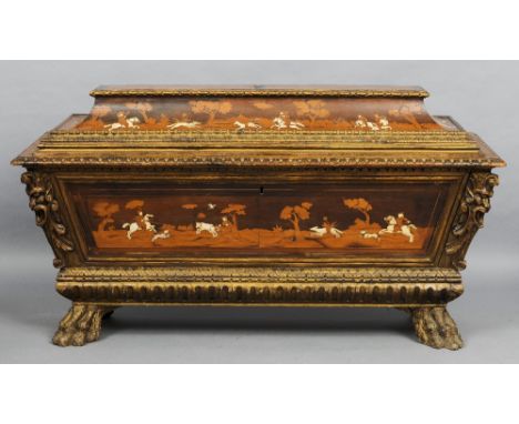 A large North Italian ivory and specimen wood inlaid cassonne
With domed hinged lid, decorated in the round with hunting and 