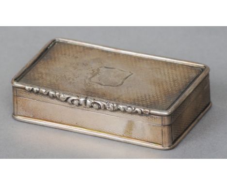 A George IV silver snuff box, hallmarked Birmingham 1825, maker's mark of ES
The hinged rectangular lid centred with a vacant