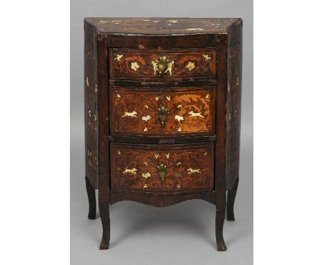 An 18th century Italian ivory and specimen wood inlaid commode
The three drawer serpentine chest inlaid throughout with vario