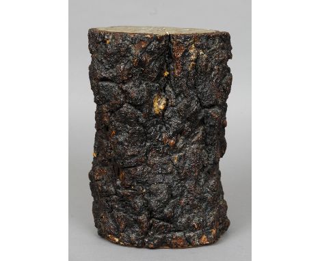 A Folk Art tree stump stool
Of natural form with a painted top.  36 cm high. CONDITION REPORTS: Overall good, some general we