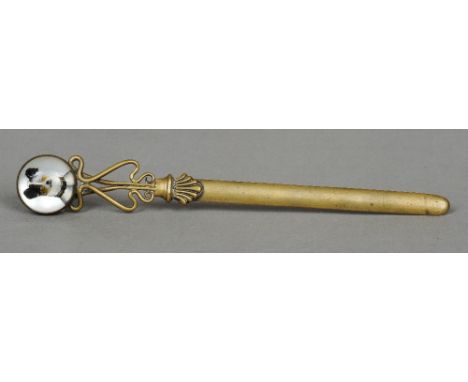 A brass Essex crystal mounted letter opener
The finial worked with a terrier's head.  22.5 cm long. CONDITION REPORTS: Genera