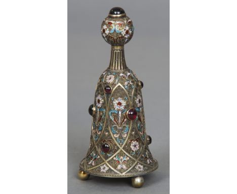 A Russian enamel decorated silver scent bottle
The main body with floral enamel scrollwork interspersed with cabochons, the s