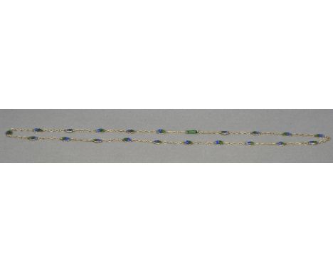 An unmarked enamel decorated necklace
Set with organic decoration.  77 cm long. CONDITION REPORTS: Overall good, some general