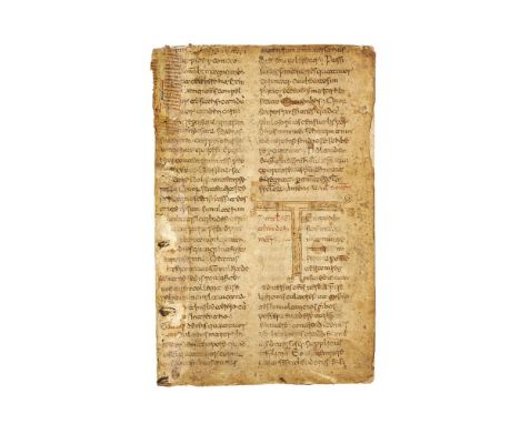 Leaf from a very large copy of the Acta Sanctorum, with a monumental decorated initial 'T', in Beneventan minuscule, in Latin