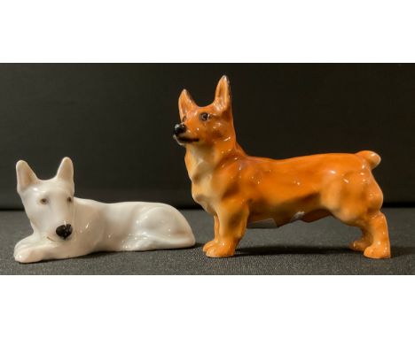 A Royal Doulton model, of a Bull Terrier, in the white, 6cm wide, printed mark;  another, Welsh Pembroke, K series, printed m