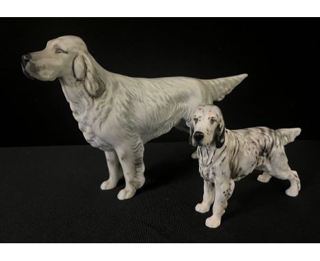 A Royal Doulton model, of an English Setter, 9.5cm high, printed marks, HN1051; another, Beswick, 14.5cm high, printed marks 