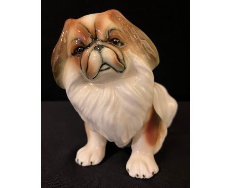 A Goldscheider model, of a Pekingese, 12.5cm high, impressed marks, model no.7630 