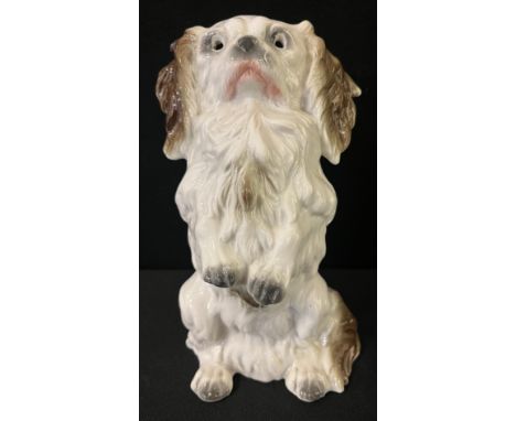 A German ceramic night light, in the form of a Pekingese, begging, 18.5cm high, 20th century 