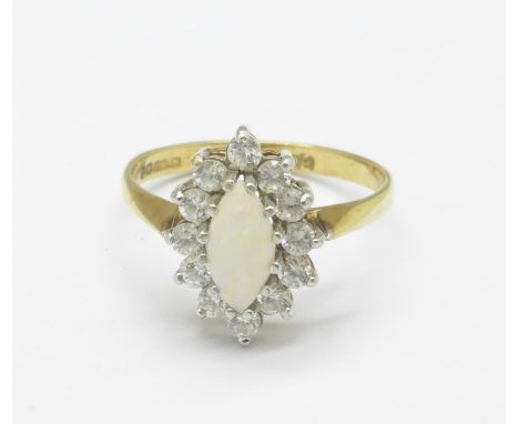 A 9ct gold, cubic zirconia and opal ring, 1.9g, M