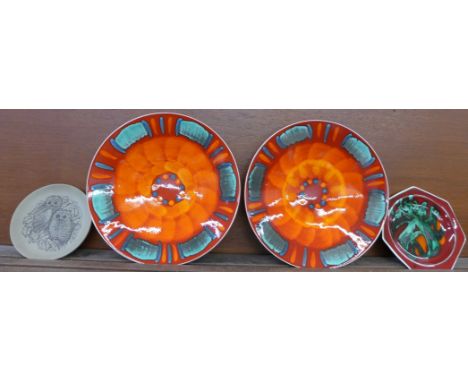 Four items of Poole pottery, both plates signed SB