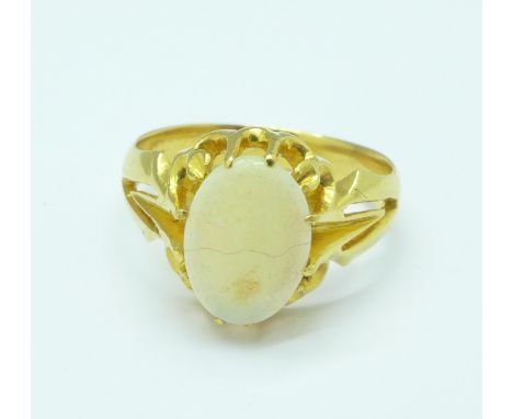 An 18ct gold and opal ring, marked 750, 4.5g, L, stone 10mm x 7mm