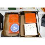 A collection of boxed Spode Christmas plates together with two Wedgwood blue jasperware Christmas