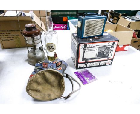 A mixed collection of items to include Brass Based Tilley Lamp, large Empty Whiskey Bottle, Vintage Scouting Bag , Prinz Proj