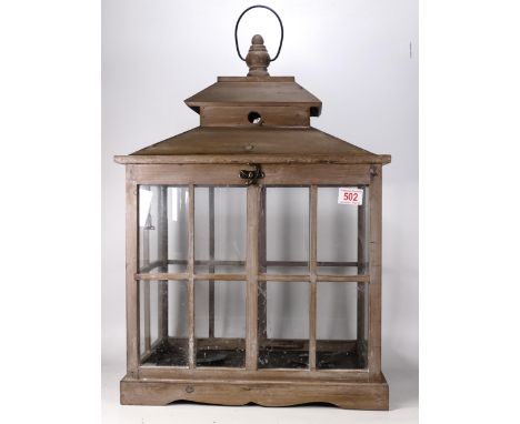 Modern wooden candle lantern . Height 59 x 43.5cm 