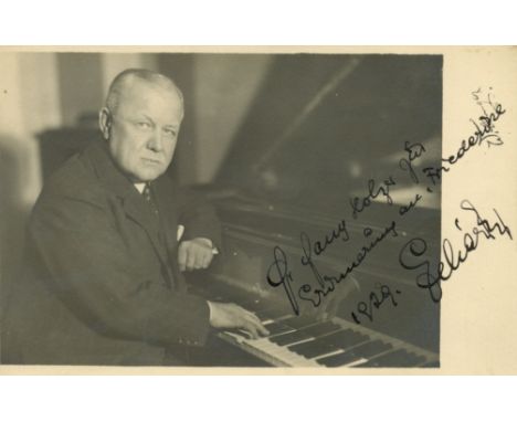 LEHAR FRANZ: (1870-1948) Austrian Composer. Vintage signed and inscribed 5 x 3.5 postcard photograph of Lehar seated, alongsi
