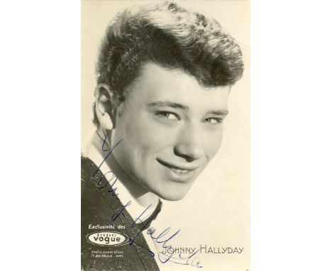HALLYDAY JOHNNY: (1943-2017) French Rock`n Roll Singer. Rare vintage signed postcard photograph by Hallyday, the promotional 