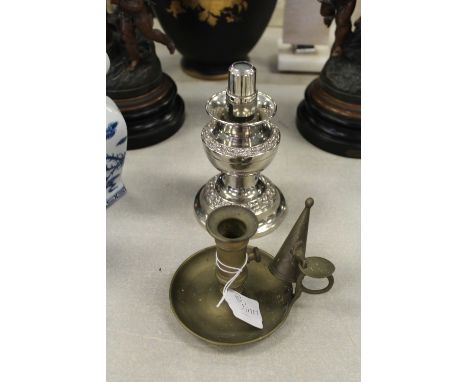 Plated spring loaded candlestick and brass candlestick