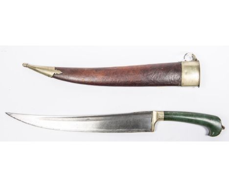 A good quality Indo Persian dagger,  single edged slightly curved watered steel blade 9¾”, WM mounted green stone or jade han