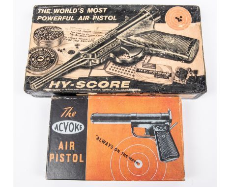 An empty carton for an "Acvoke" air pistol, with orange and black lid, containing simple leaflet with printed loading instruc