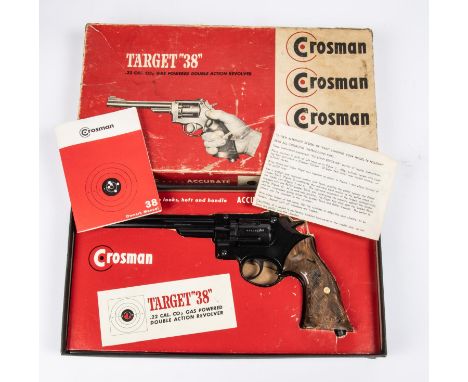 A 6 shot .177" Crosman "Target 38" double action CO2 pistol, number N78231120, with satin black finish and mottled brown plas