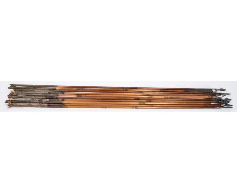 A set of three 18th century Indian arrows, with small plain leaf shaped heads; another, with rectangular section chisel point