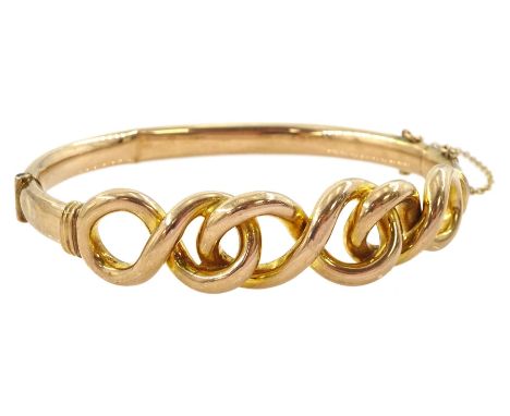 Early 20th century 9ct rose gold infinity link hinged bangle, stampedCondition Report:Approx 12.1gm, inner circumference = 17