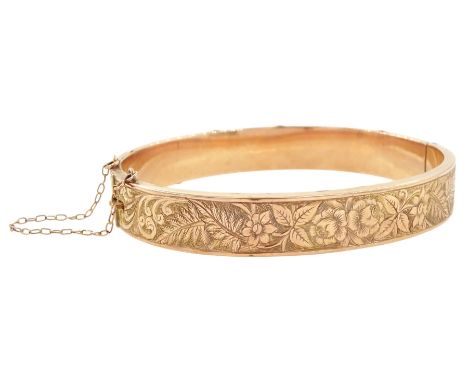 Early 20th century rose gold foliate engraved hinged bangle, Birmingham 1902Condition Report:Approx 9.3gm, inner circumferenc