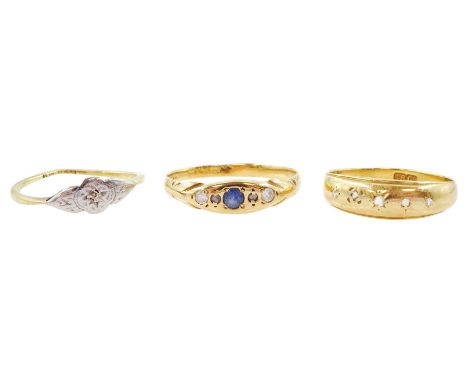 Three Victorian and later 18ct gold rings including five stone diamond rubover set, three stone paste and and single stone di