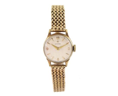 Omega ladies 9ct gold manual wind wristwatch, silvered dial with Arabic and dagger hour batons, Birmingham 1957, on 9ct gold 