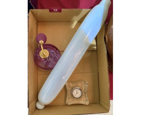 An Edinburgh Crystal clock, a Caithness atomiser scent bottle and a glass rolling pin