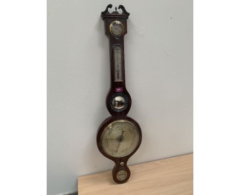 A 19th century mahogany and line inlaid mercurial wheel barometer. 37½' high
